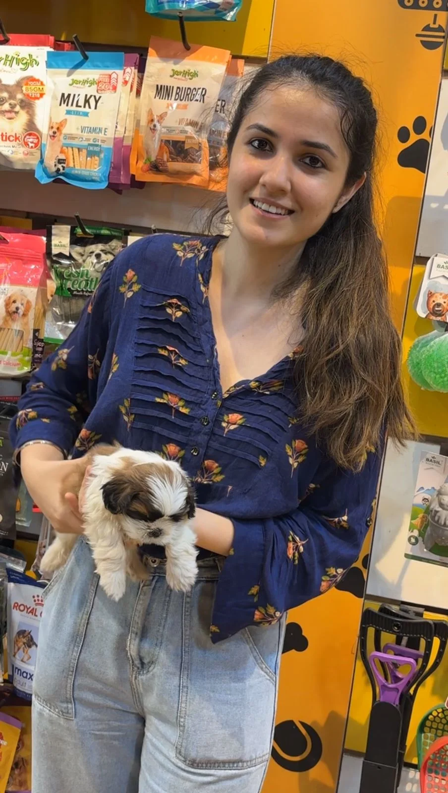 Happy customer with puppy at Kyra Pet Shop