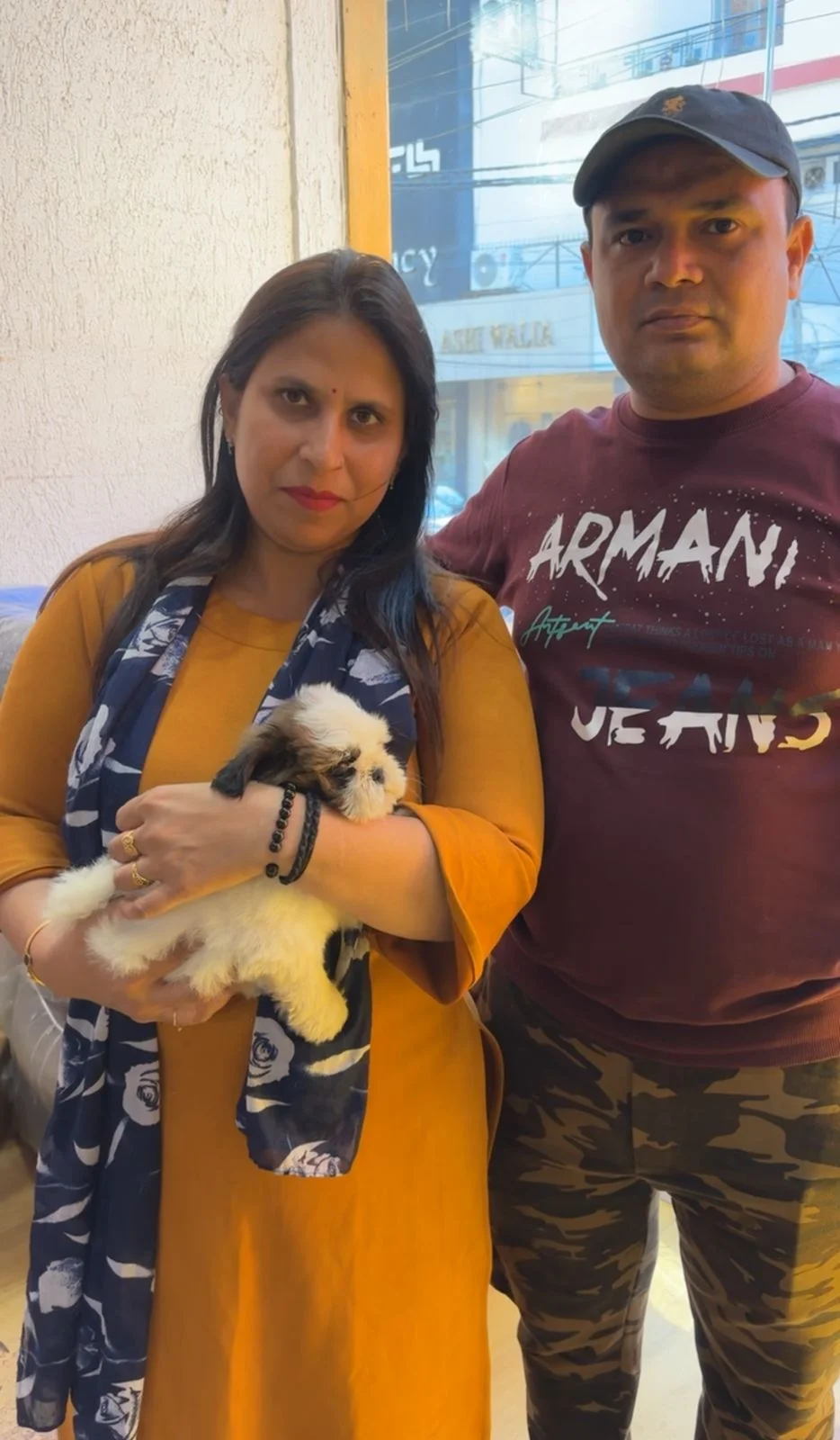 Happy customer with puppy at Kyra Pet Shop