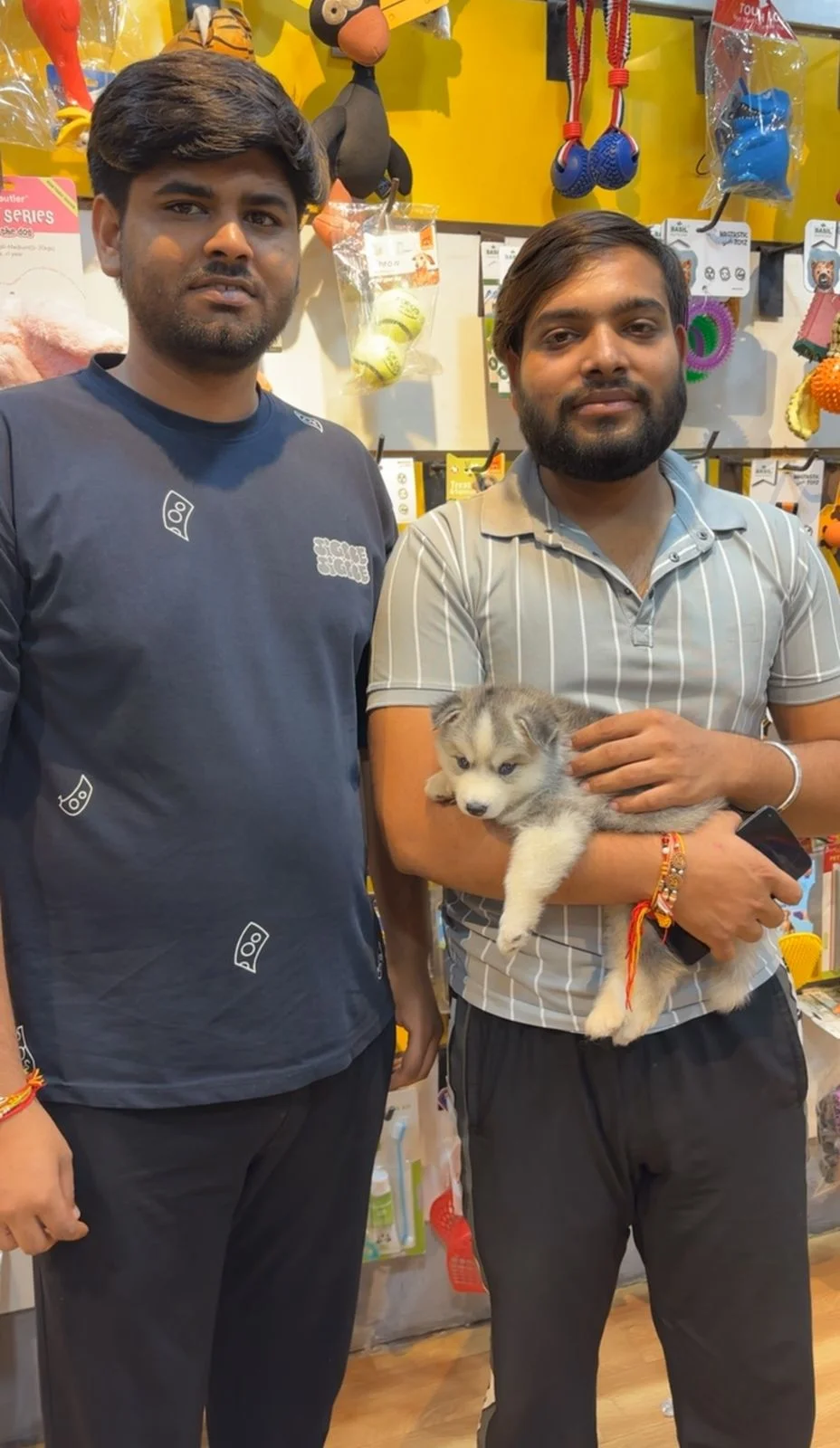 Happy customer with puppy at Kyra Pet Shop
